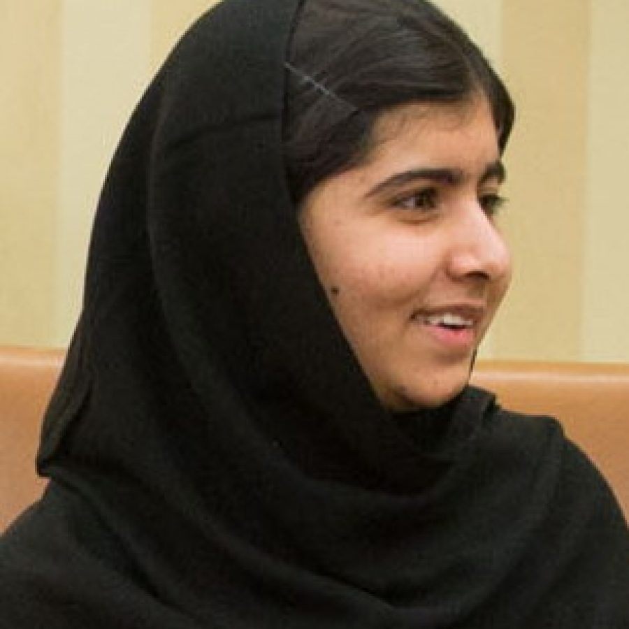 President Barack Obama, First Lady Michelle Obama, and their daughter Malia meet with Malala Yousafzai, the young Pakistani schoolgirl who was shot in the head by the Taliban a year ago, in the Oval Office, Oct. 11, 2013. 
(Official White House Photo by Pete Souza)